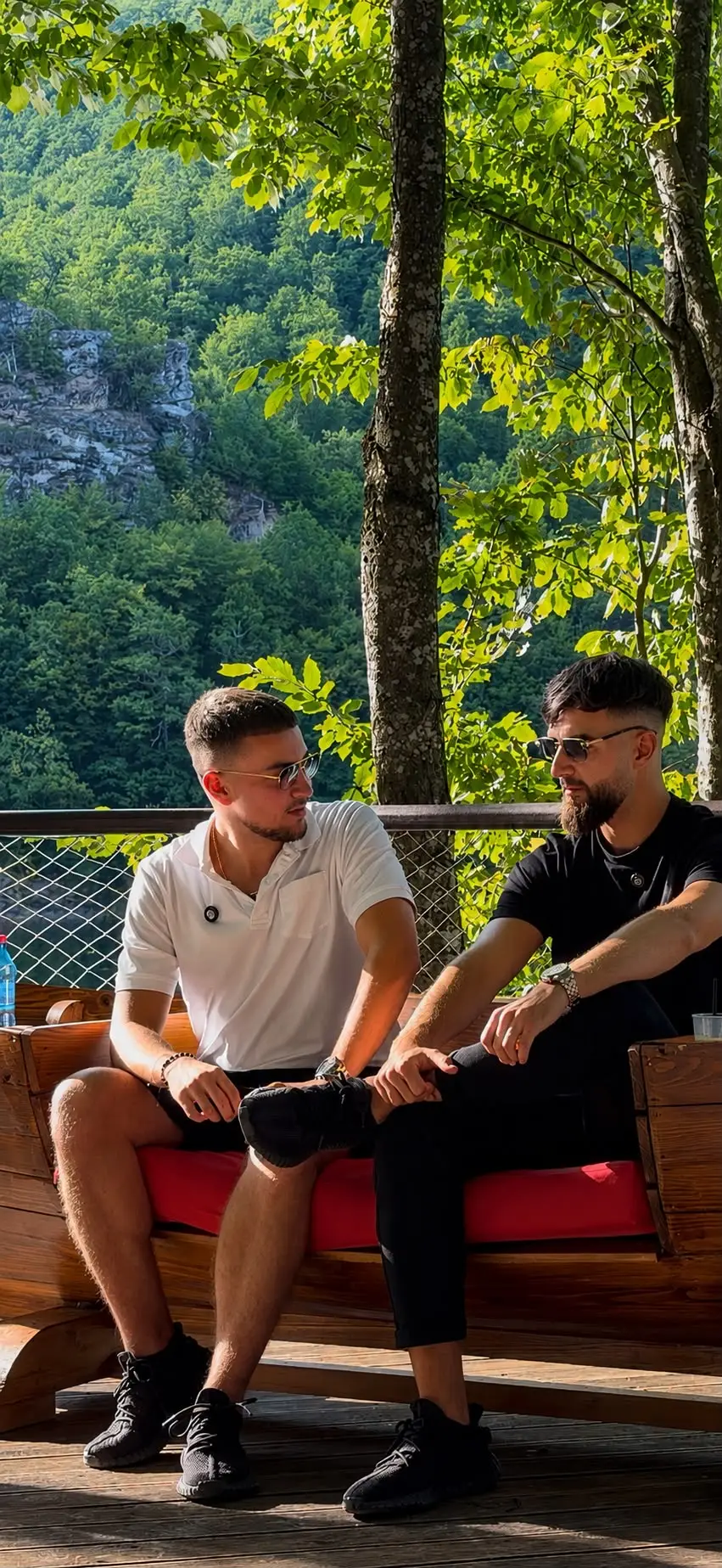 The ScalEcom founders talking on a bench